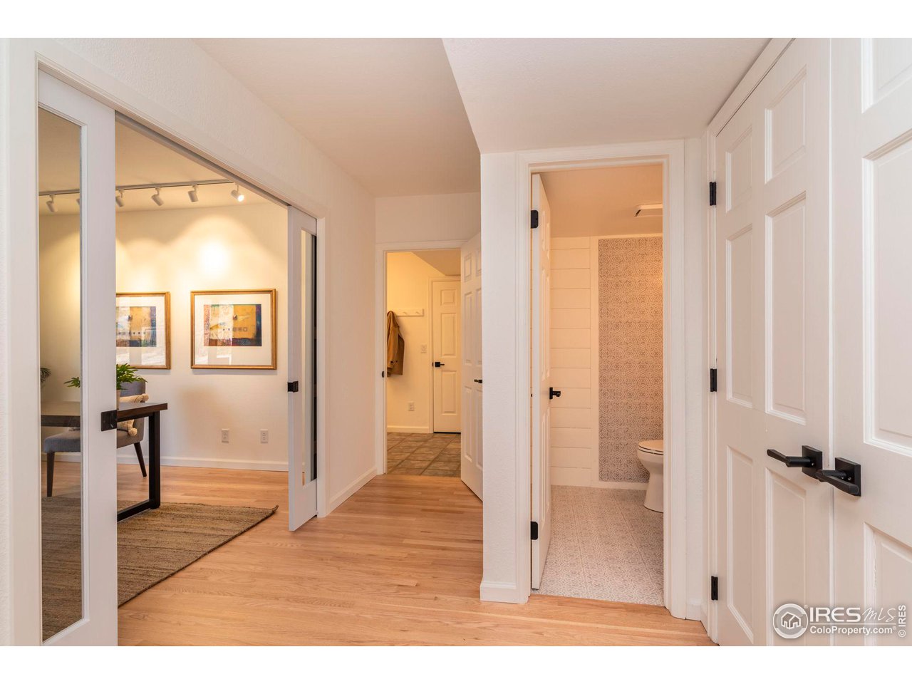 5332 Spotted Horse Trail Boulder, CO 80301 - Photo 16 of 40 a bathroom with a glass door shower and a sink