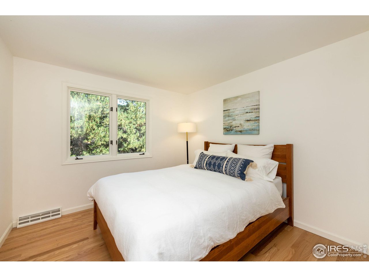 5332 Spotted Horse Trail Boulder, CO 80301 - Photo 30 of 40 a bedroom with a bed and a window