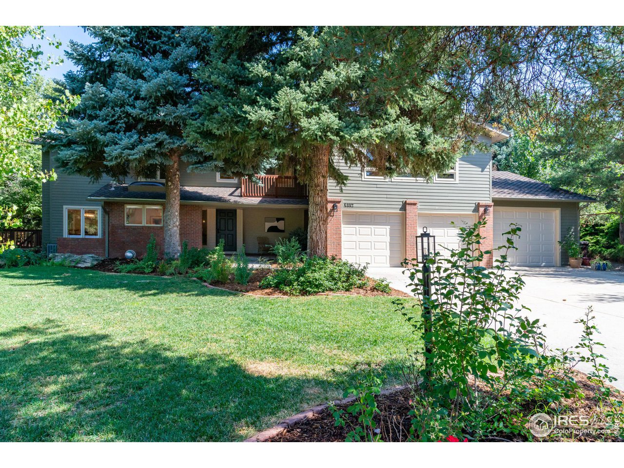 5332 Spotted Horse Trail Boulder, CO 80301 - Photo 40 of 40 a front view of a house with a yard