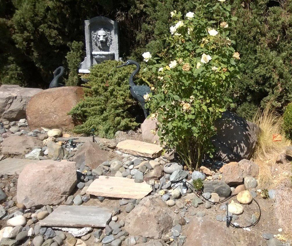 1509 Pomeroy Place Santa Rosa, CA 95403 - Photo 1 of 1 a view of a bunch of flowers in a yard