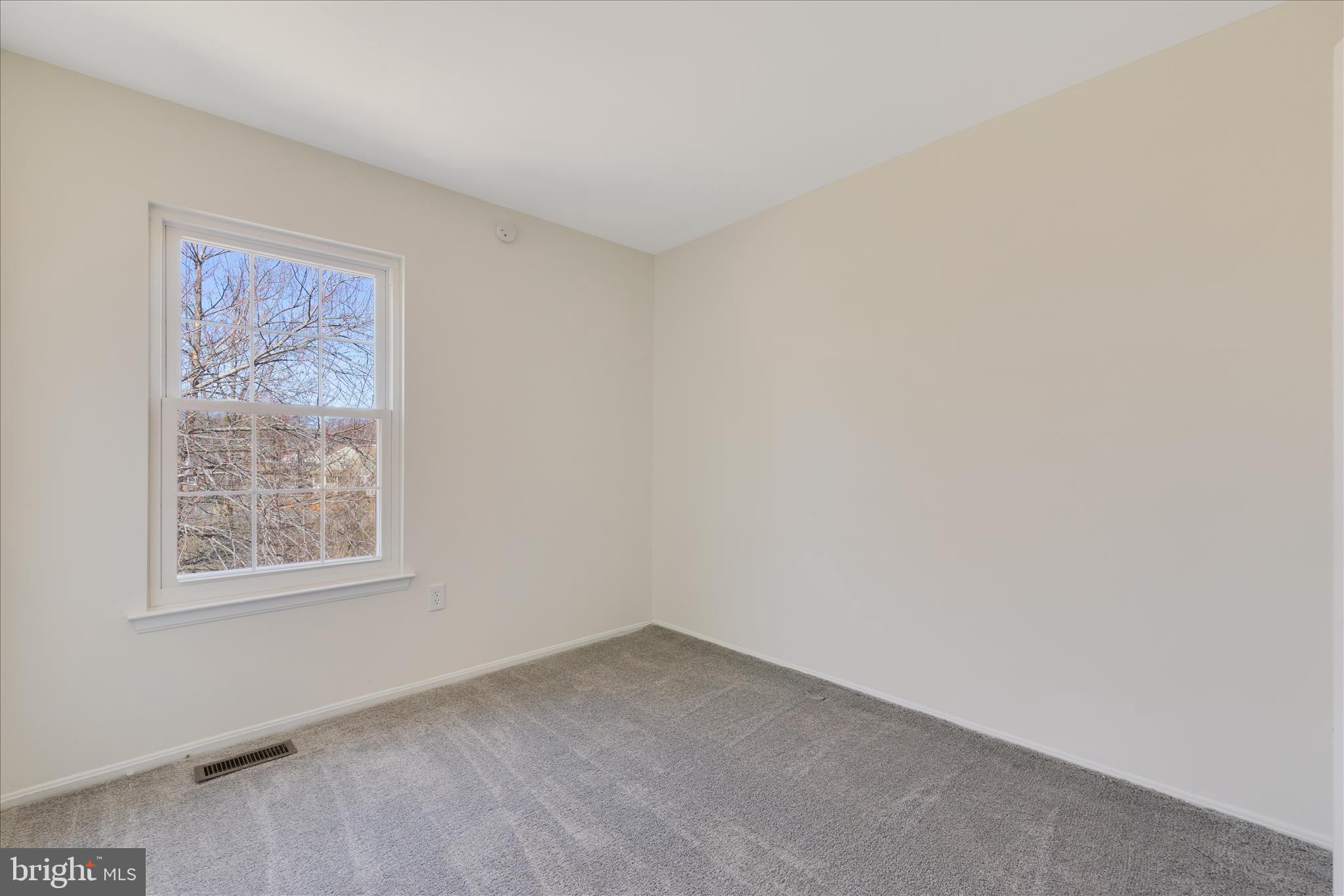 8710 Post Oak Way Landover, MD 20785 - Photo 16 of 38 an empty room with a window