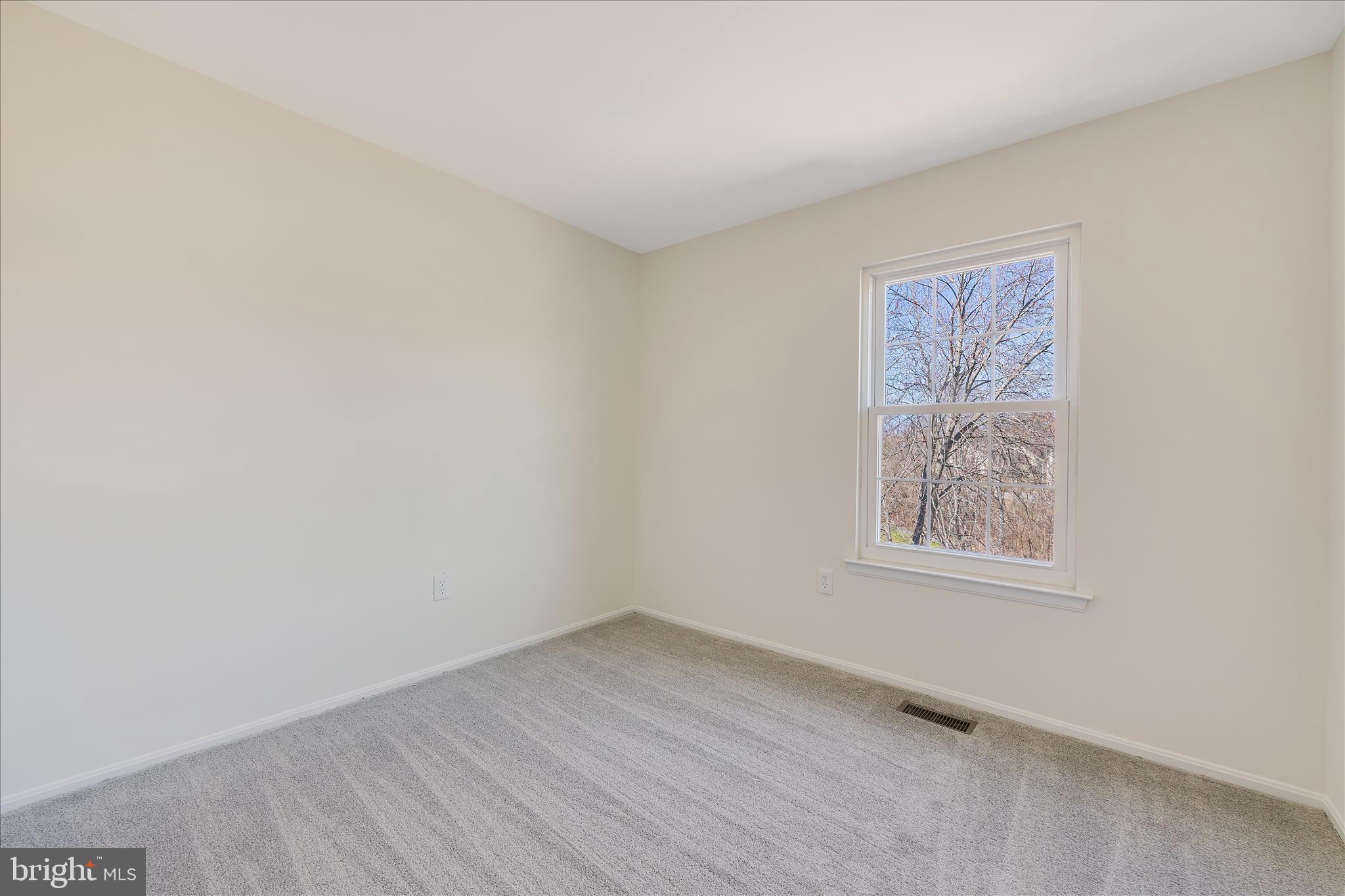 8710 Post Oak Way Landover, MD 20785 - Photo 19 of 38 an empty room with a window