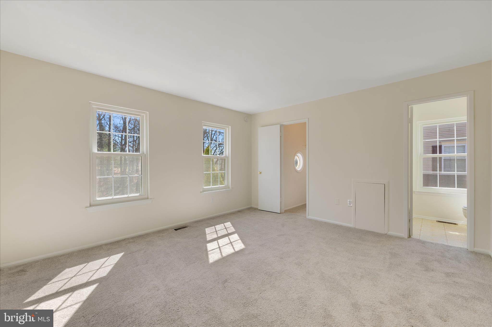 8710 Post Oak Way Landover, MD 20785 - Photo 21 of 38 an empty room with windows