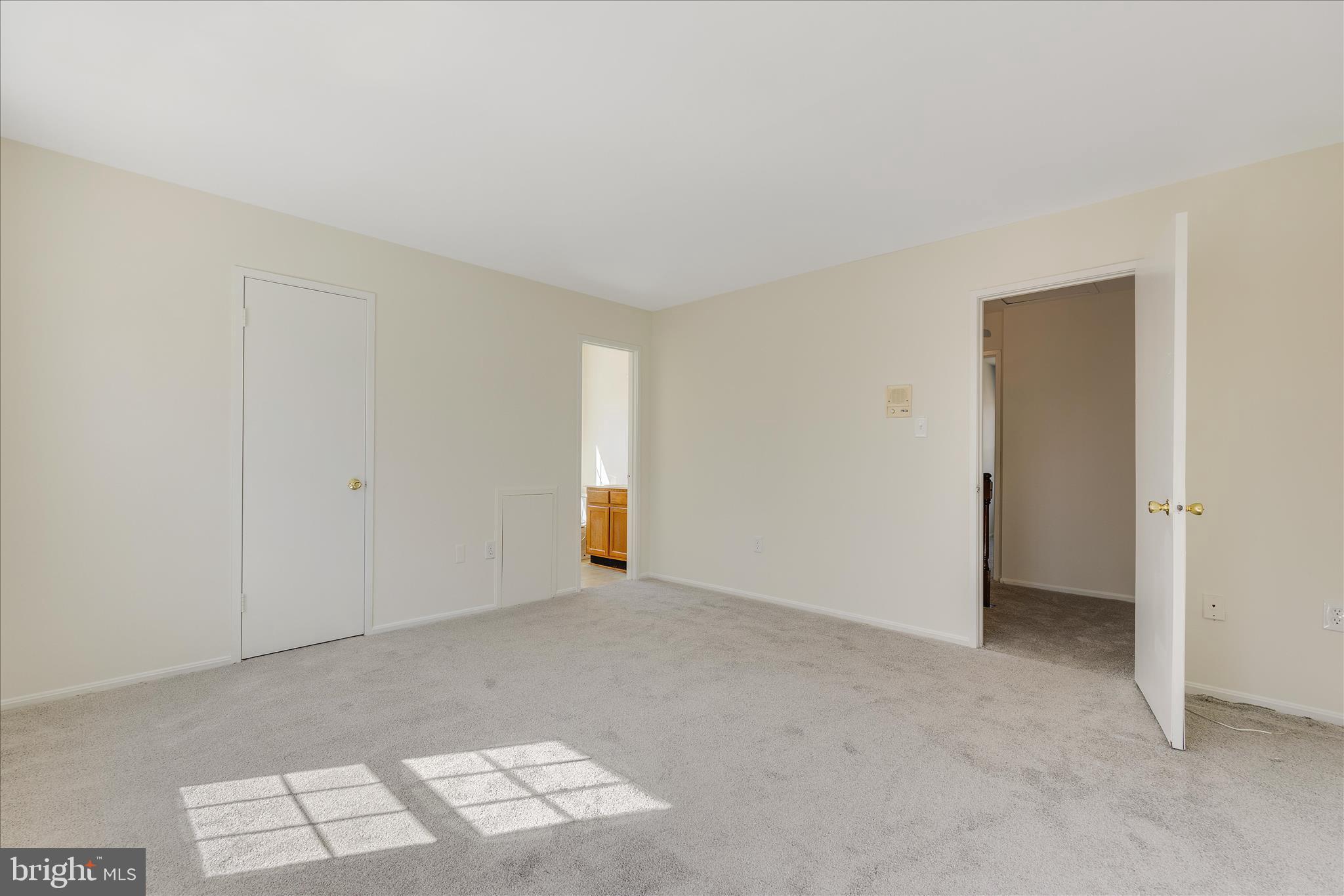 8710 Post Oak Way Landover, MD 20785 - Photo 22 of 38 an empty room with windows