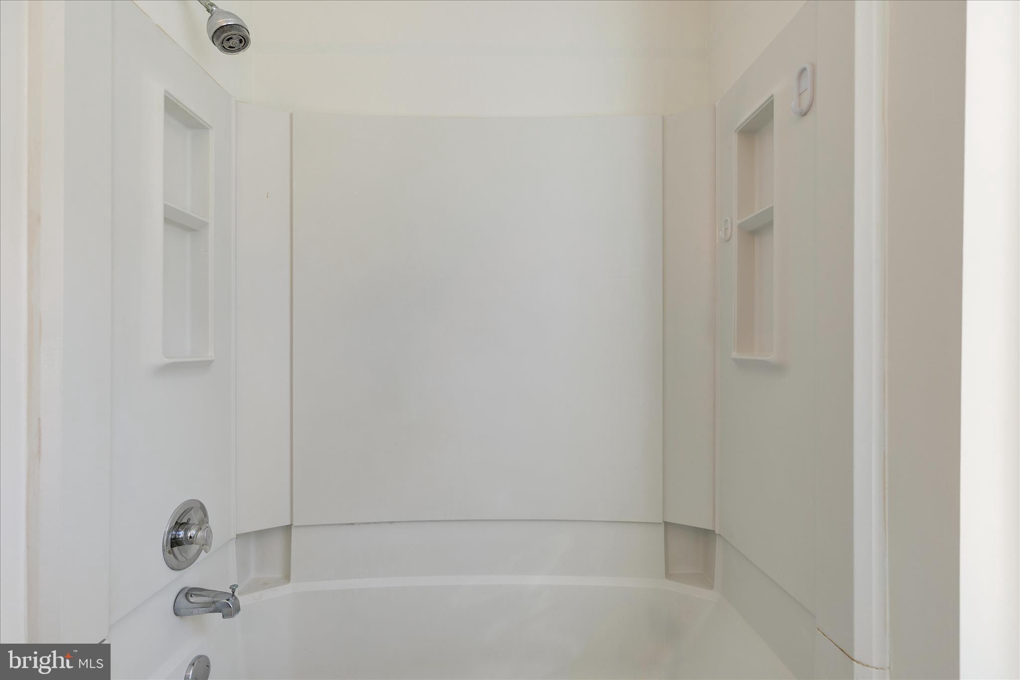 8710 Post Oak Way Landover, MD 20785 - Photo 25 of 38 a bathroom with a bathtub