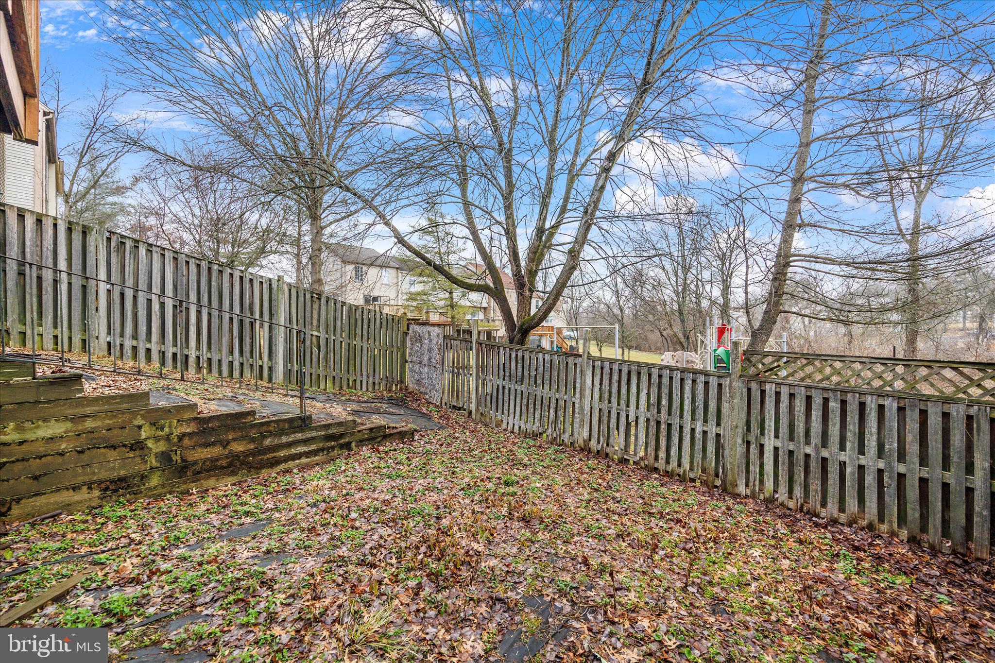 8710 Post Oak Way Landover, MD 20785 - Photo 34 of 38 a view of a yard with wooden fence