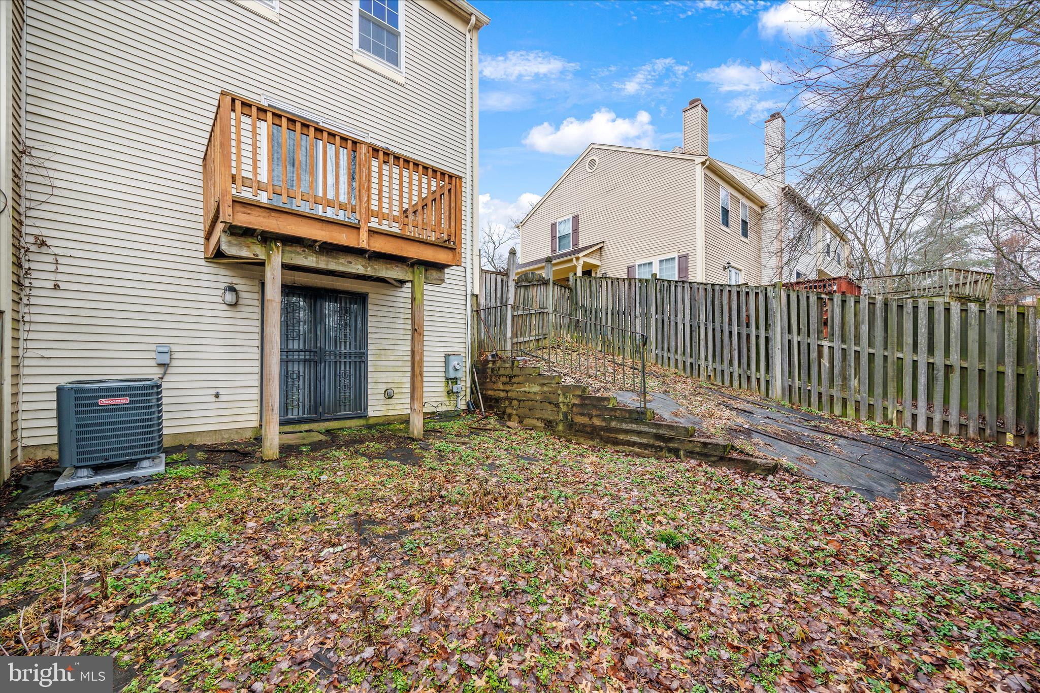 8710 Post Oak Way Landover, MD 20785 - Photo 35 of 38 a view of a house with a wooden fence
