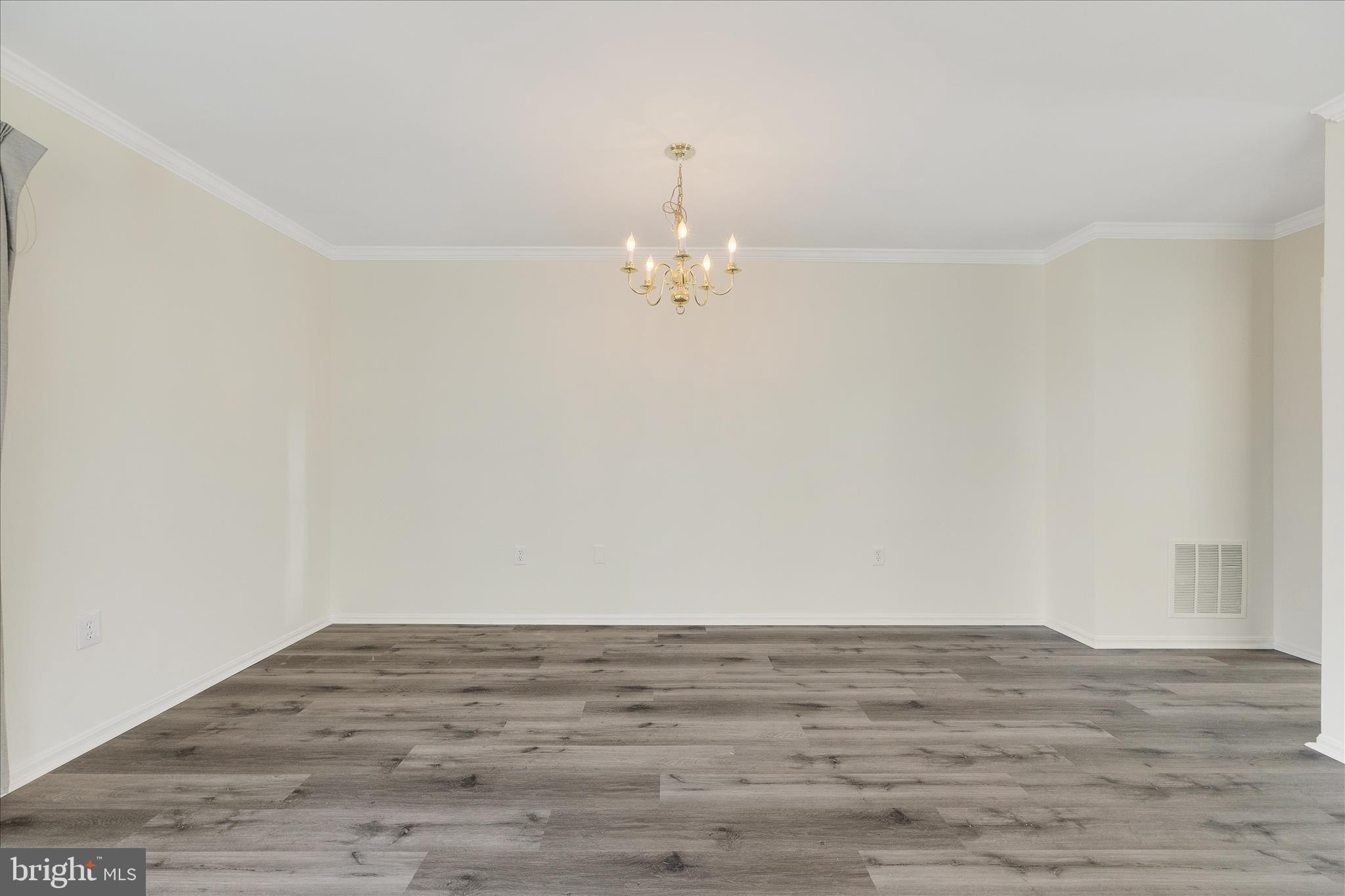 8710 Post Oak Way Landover, MD 20785 - Photo 8 of 38 a view of a room with wooden floor and ceiling fan