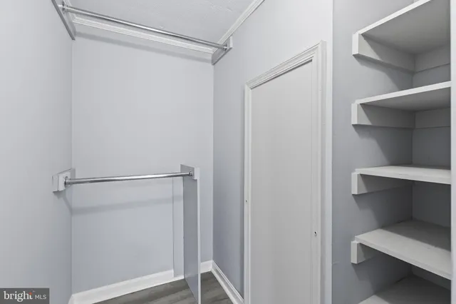 a bathroom with a shower and toilet