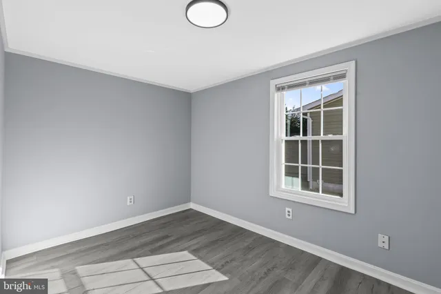 a view of empty room with windows