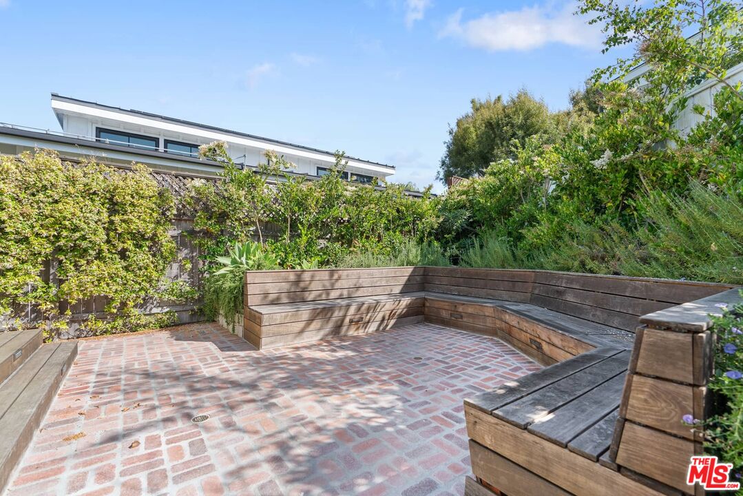 249 Paradise Cove Road Malibu, CA 90265 - Photo 31 of 41 a view of a backyard with seating area