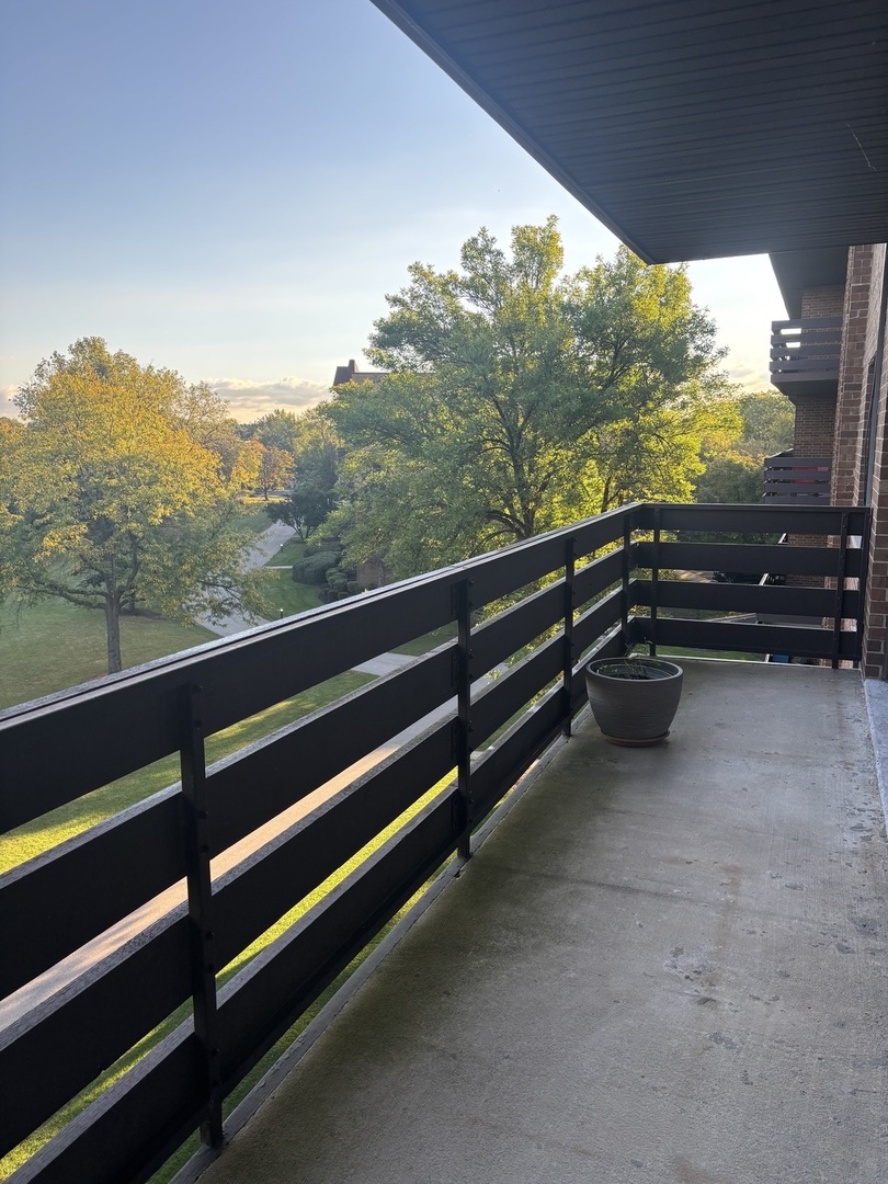 2000 Chestnut Avenue, Unit 407 Glenview, IL 60025 - Photo 11 of 25 a view of outdoor space with lots of swings and slides