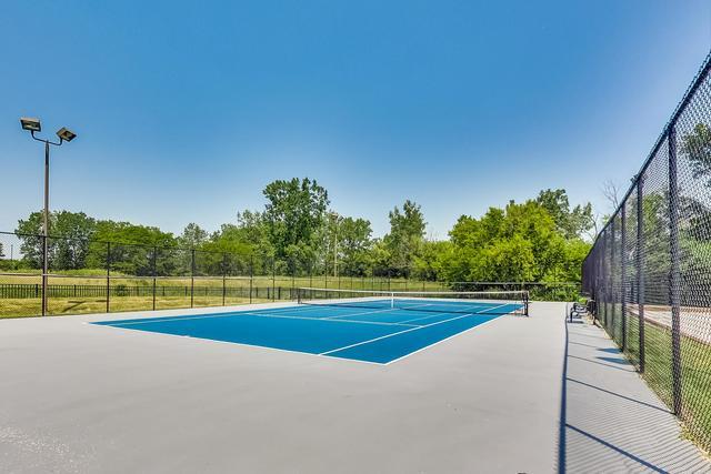 2000 Chestnut Avenue, Unit 407 Glenview, IL 60025 - Photo 23 of 25 a view of a tennis court