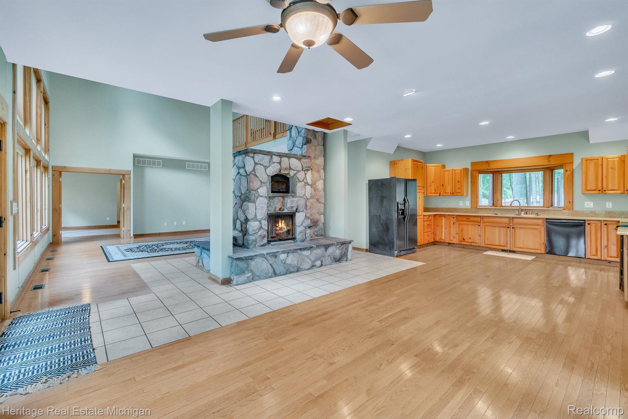 3754 Brighton Road Howell, MI 48843 - Photo 12 of 62 Dining Room with Fire Place and Pizza Oven