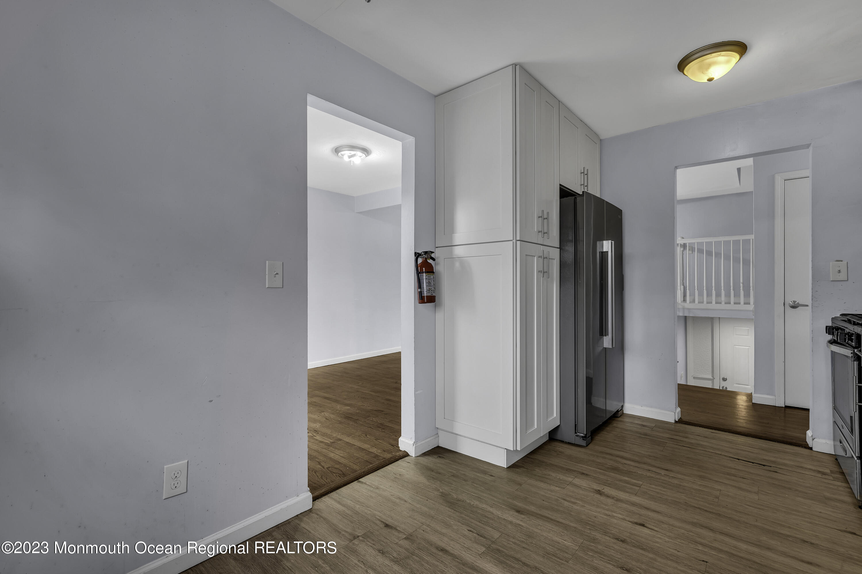 28 Citadel Drive Jackson, NJ 08527 - Photo 11 of 26 a view of an empty room with wooden floor and a window
