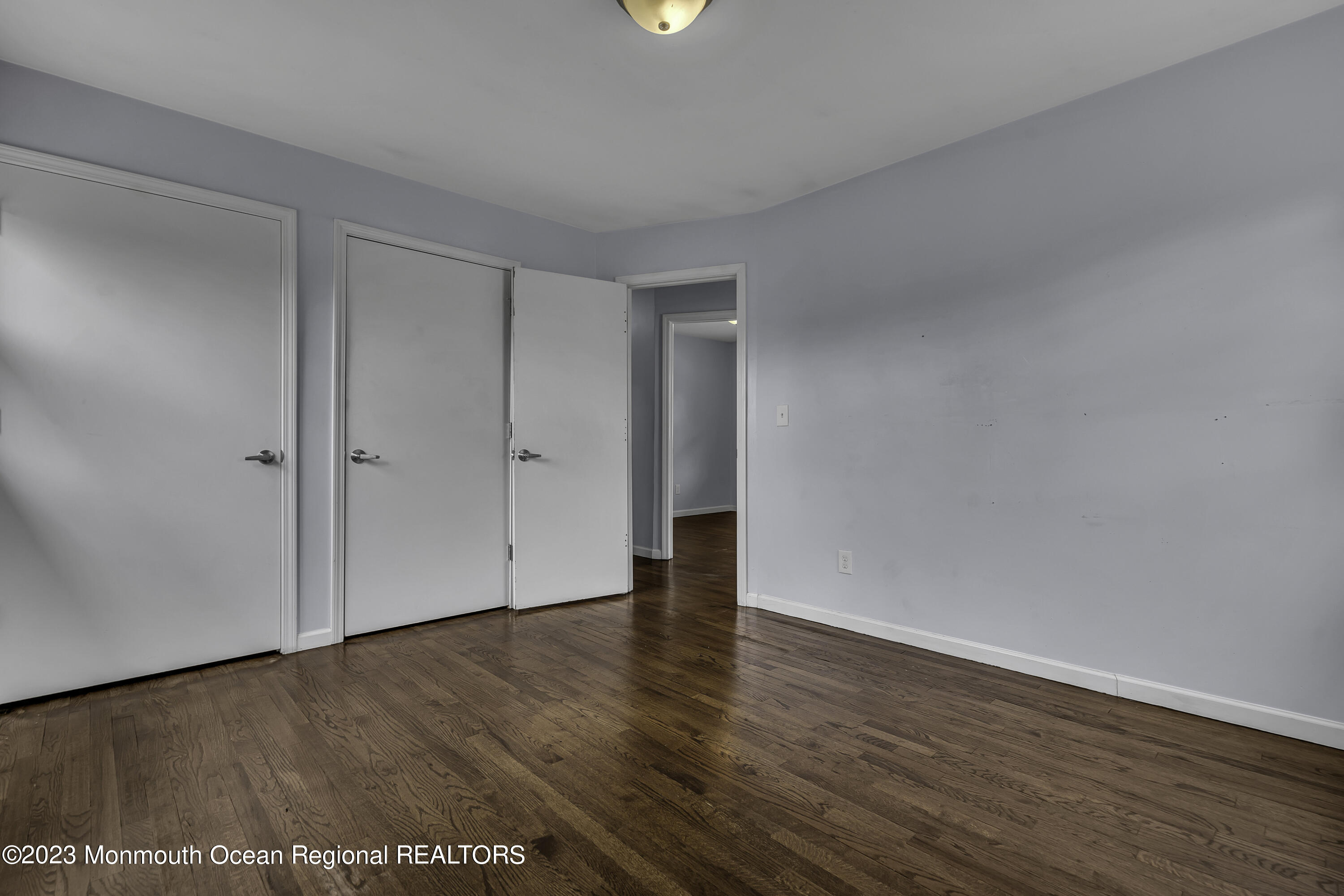 28 Citadel Drive Jackson, NJ 08527 - Photo 13 of 26 a view of an empty room with wooden floor