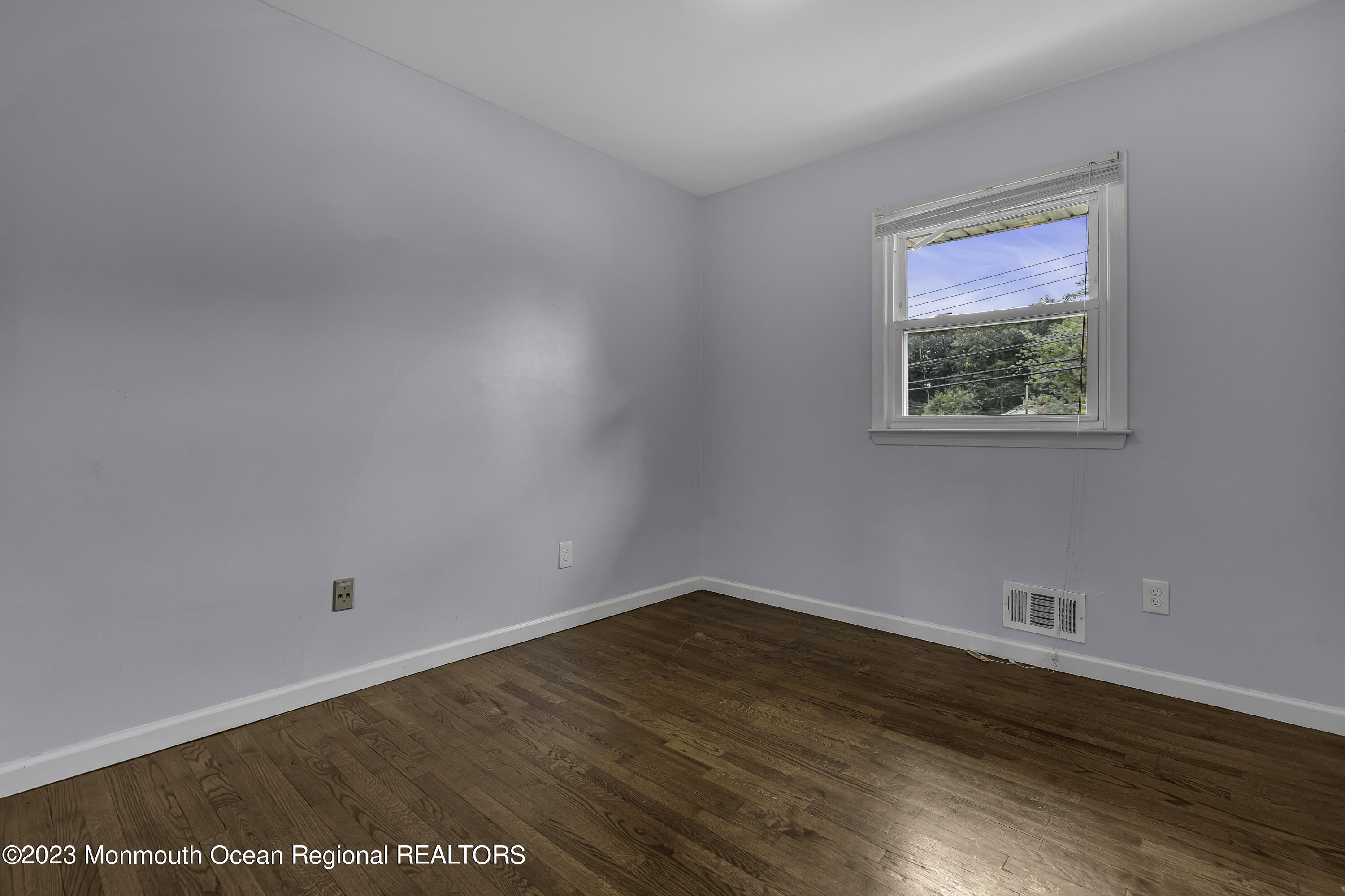 28 Citadel Drive Jackson, NJ 08527 - Photo 16 of 26 a view of empty room with wooden floor
