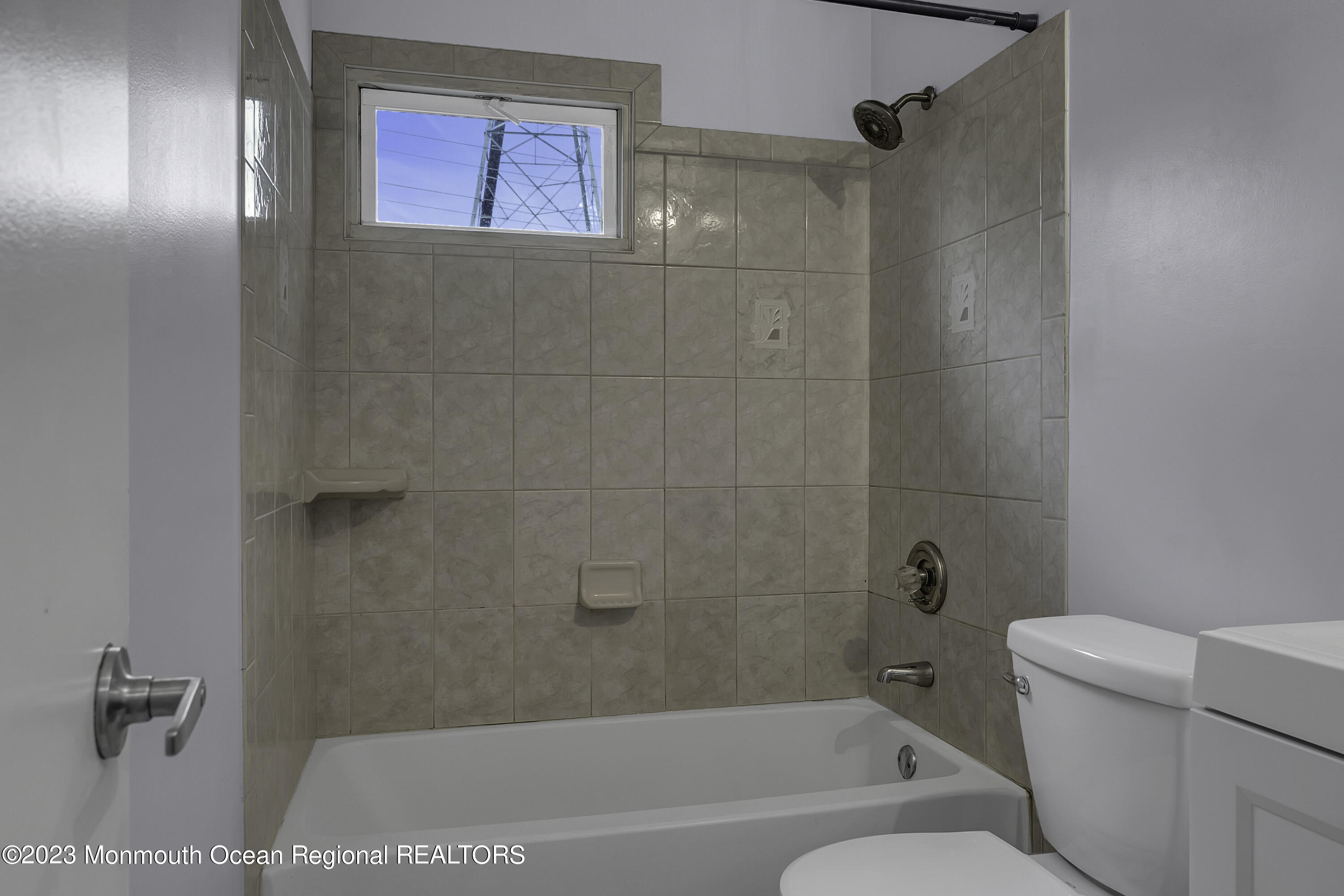 28 Citadel Drive Jackson, NJ 08527 - Photo 19 of 26 a bathroom with a bathtub a toilet and a shower