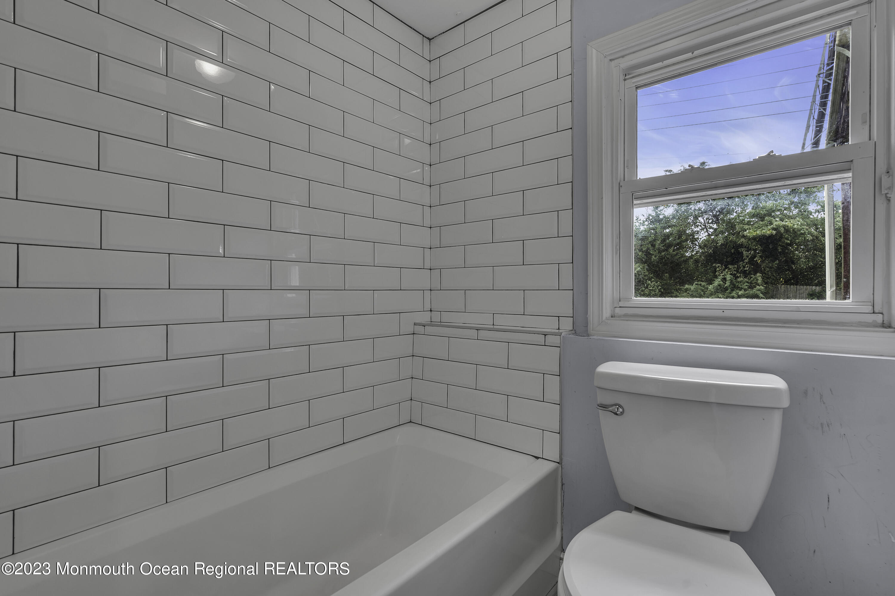 28 Citadel Drive Jackson, NJ 08527 - Photo 23 of 26 a bathroom with a toilet and a bathtub