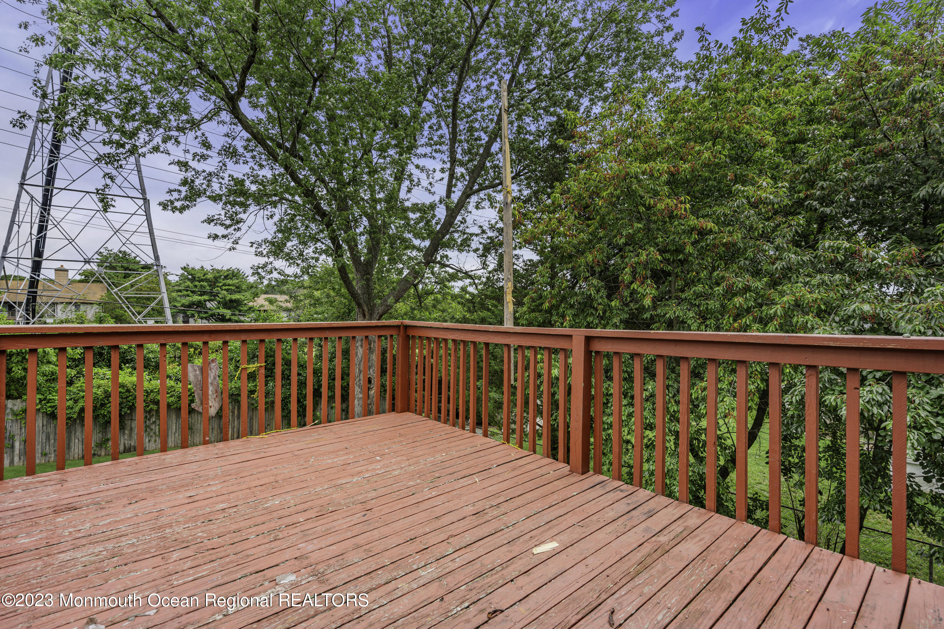 28 Citadel Drive Jackson, NJ 08527 - Photo 25 of 26 a balcony with wooden floor and trees