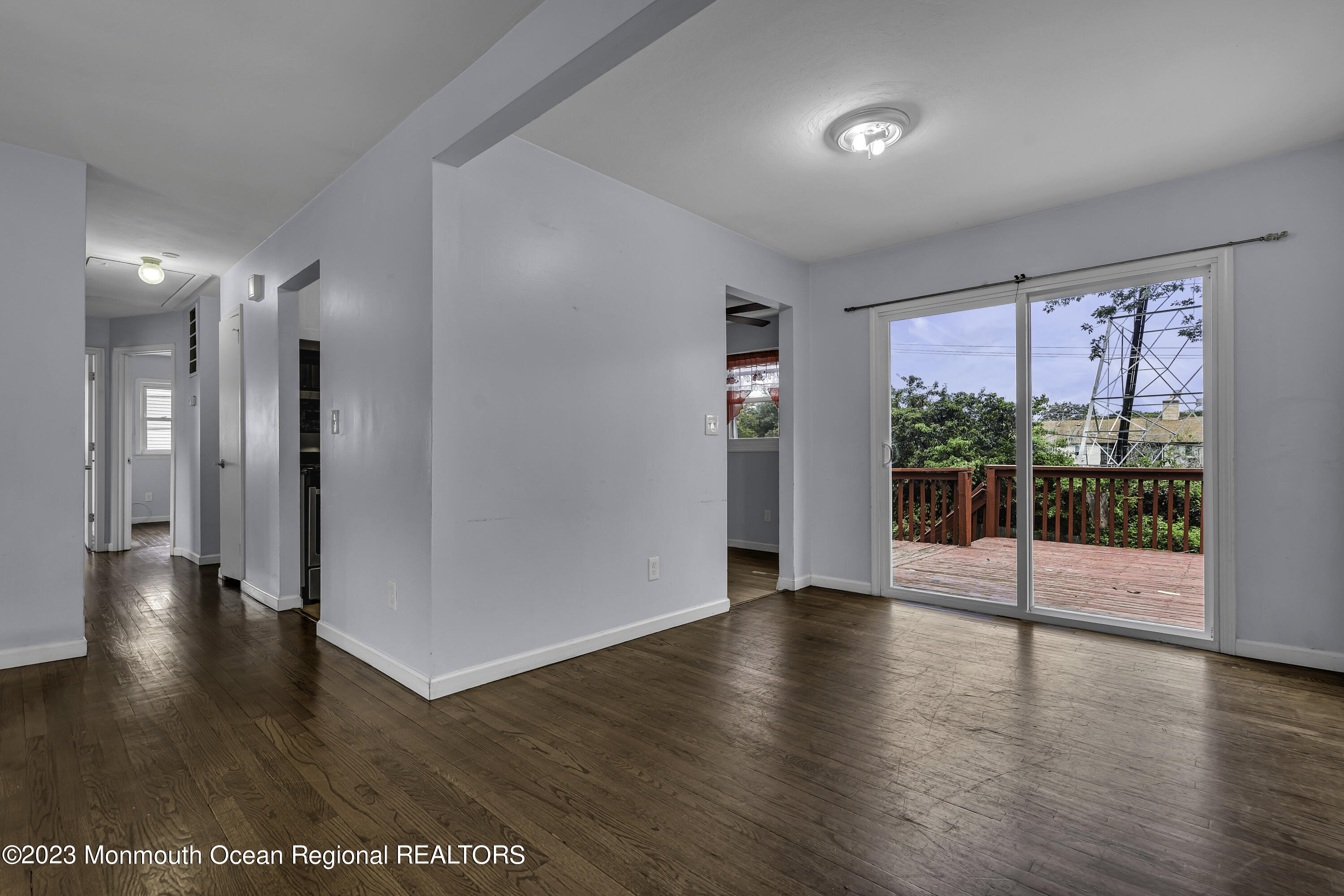 28 Citadel Drive Jackson, NJ 08527 - Photo 3 of 26 a view of an empty room with wooden floor and a window