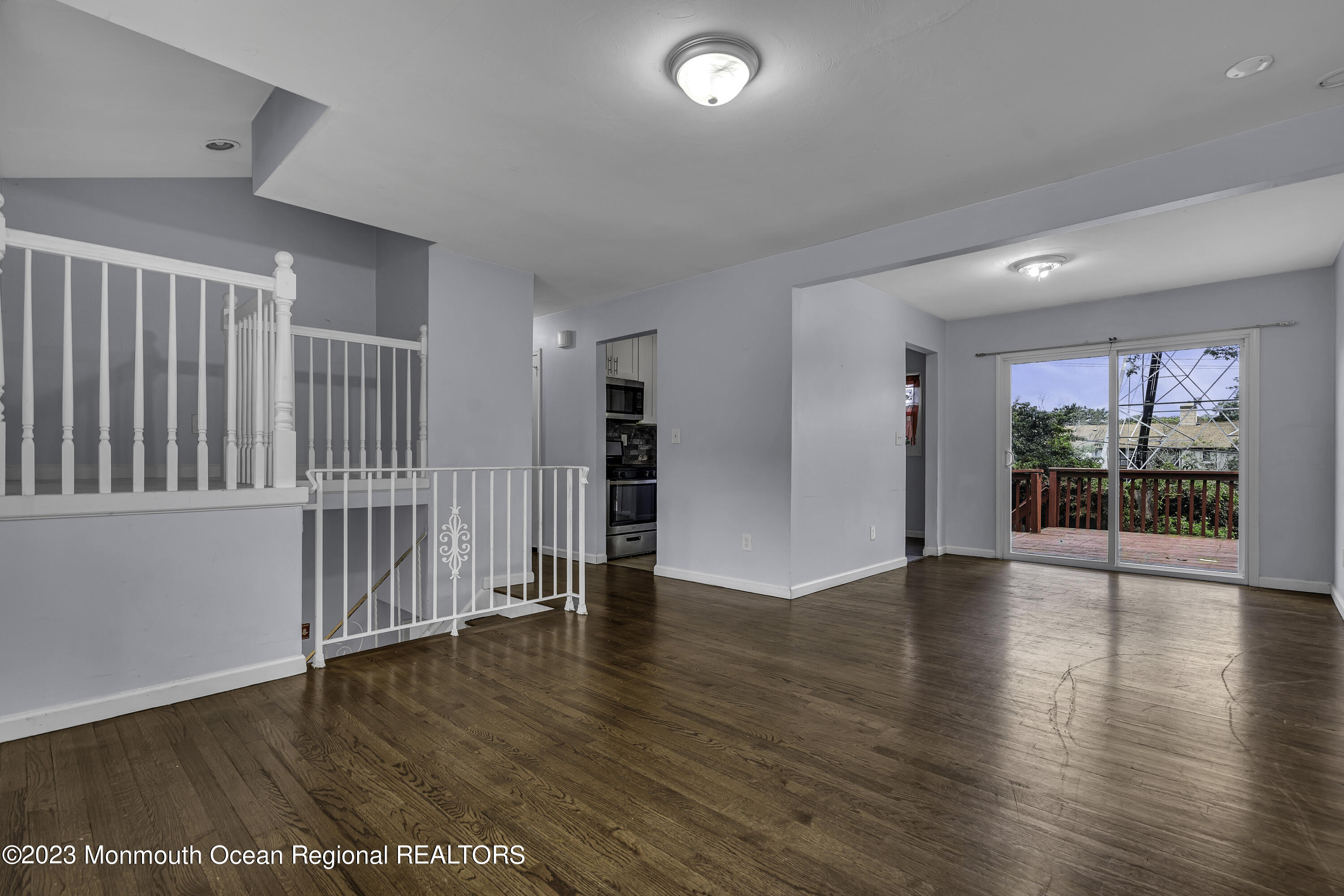28 Citadel Drive Jackson, NJ 08527 - Photo 4 of 26 a view of an empty room with wooden floor and a window