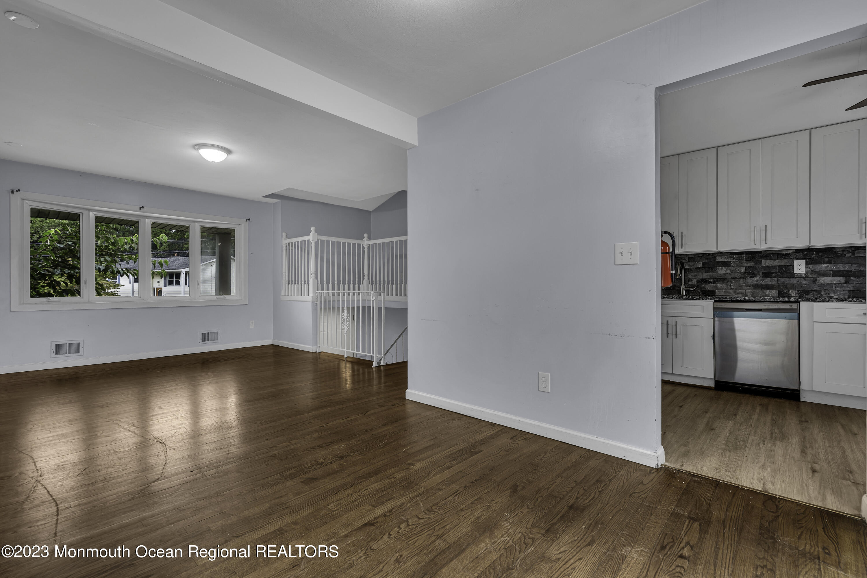 28 Citadel Drive Jackson, NJ 08527 - Photo 6 of 26 a view of a kitchen with wooden floor and a sink