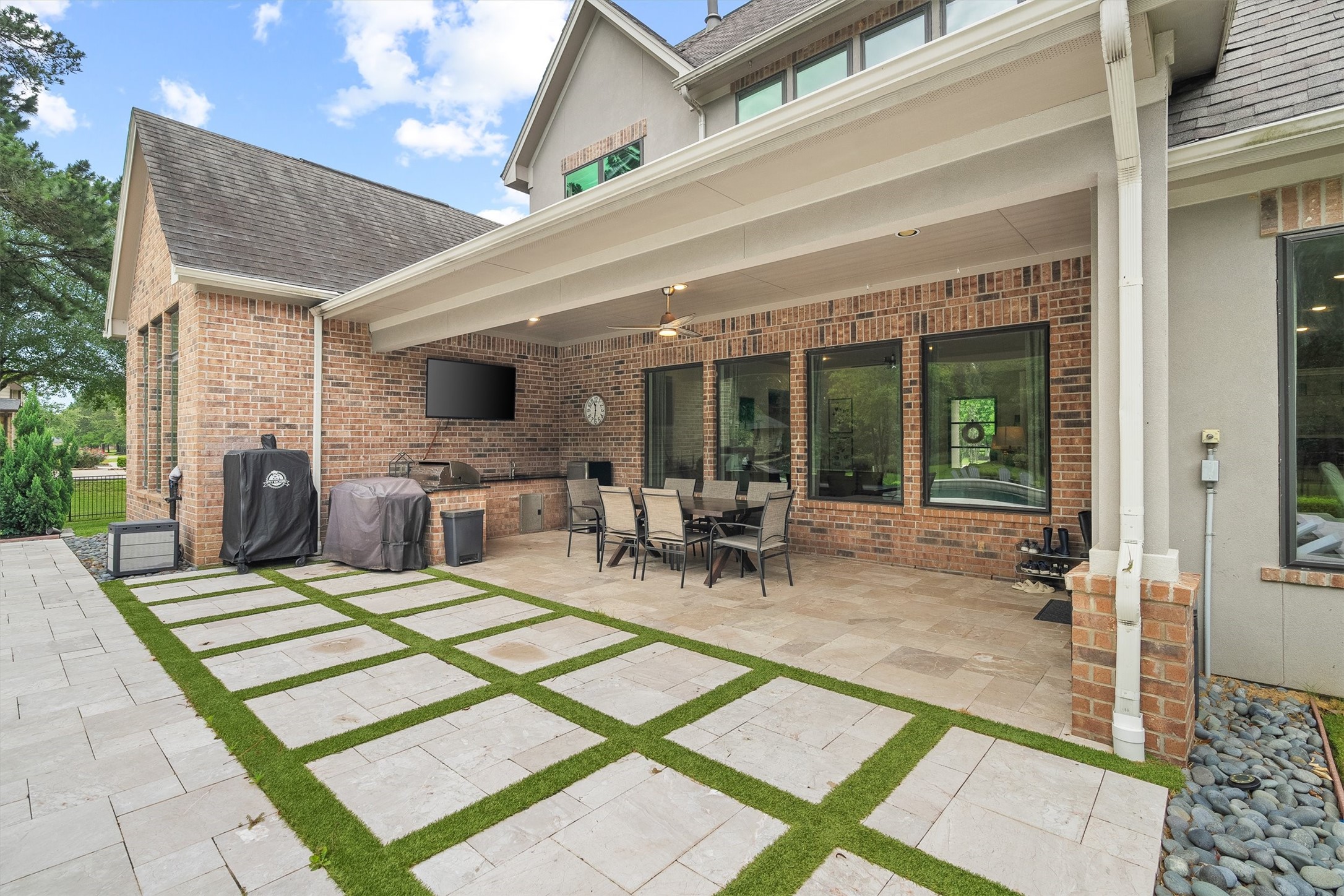 30702 Spring Lake Boulevard Tomball, TX 77375 - Photo 42 of 49 Travertine patio for no-slip with outdoor kitchen