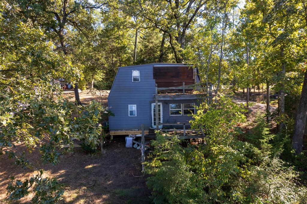 201 County Road Pittsburg, TX 75686 - Photo 5 of 6 a view of a back yard