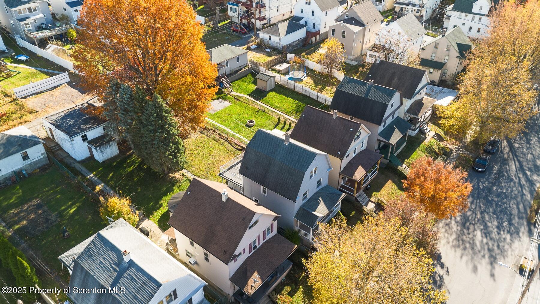 1018 Madison Avenue Scranton, PA 18510 - Photo 3 of 12 an aerial view of a house with a yard