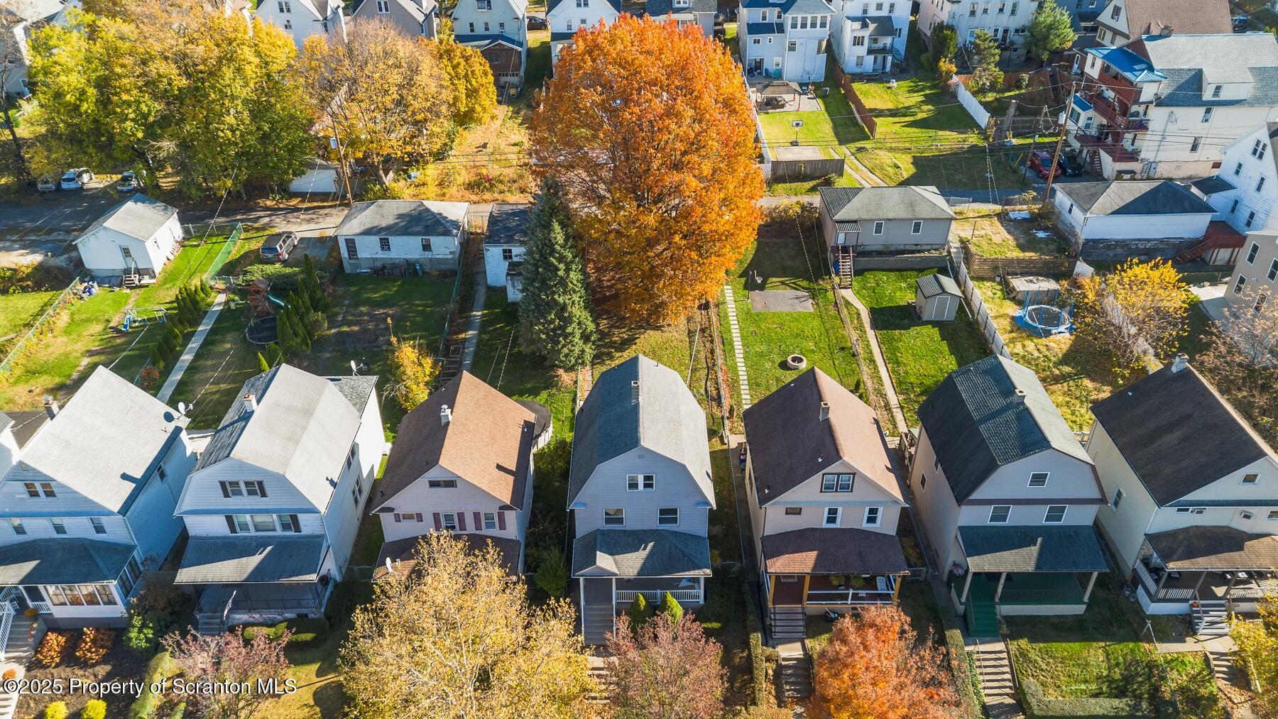 1018 Madison Avenue Scranton, PA 18510 - Photo 4 of 12 a aerial view of a house with a yard and fountain