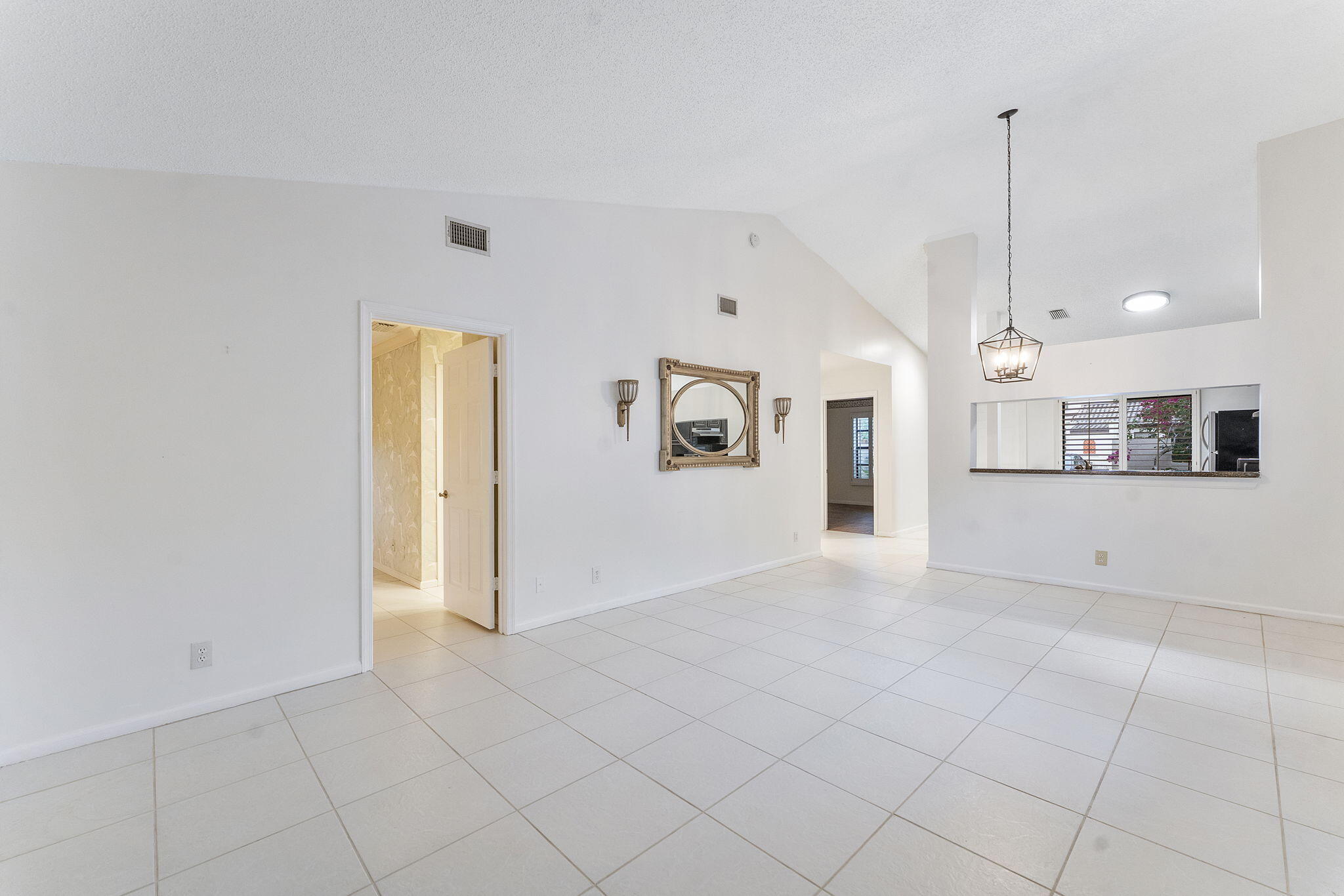 3088 Inglewood Terrace Boca Raton, FL 33431 - Photo 12 of 30 a view of a kitchen with a sink and a refrigerator
