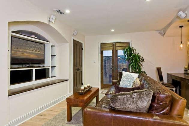 1030 Mandalay Beach Road Oxnard, CA 93035 - Photo 12 of 39 a living room with furniture fireplace and flat screen tv