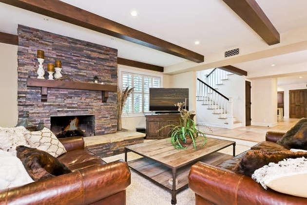 1030 Mandalay Beach Road Oxnard, CA 93035 - Photo 14 of 39 a living room with furniture a flat screen tv and a fireplace