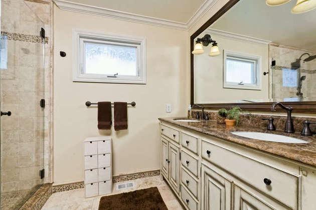 1030 Mandalay Beach Road Oxnard, CA 93035 - Photo 22 of 39 a bathroom with stainless steel appliances granite countertop a sink and a mirror