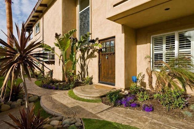 1030 Mandalay Beach Road Oxnard, CA 93035 - Photo 36 of 39 a view of a potted plants on a sidewalk