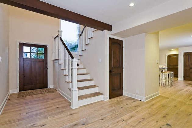 1030 Mandalay Beach Road Oxnard, CA 93035 - Photo 5 of 39 a view of entryway with wooden floor and stairs