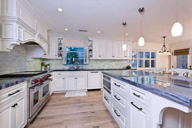1030 Mandalay Beach Road Oxnard, CA 93035 - Photo 8 of 39 a kitchen with stainless steel appliances granite countertop a stove a sink and a granite counter tops