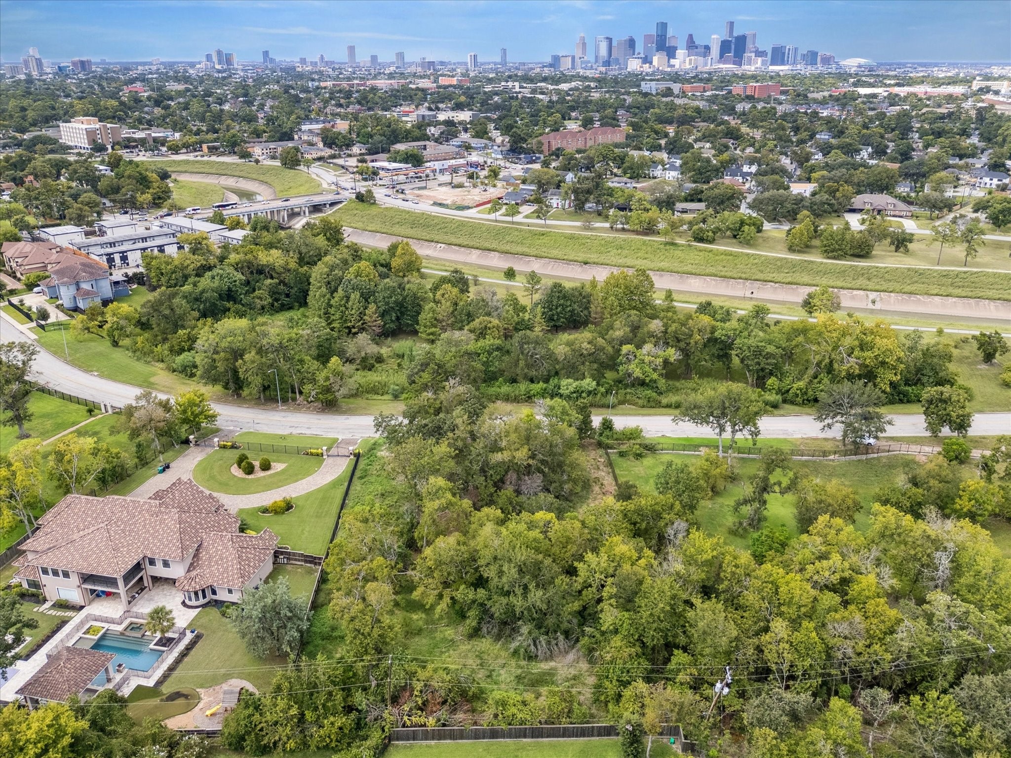 0 South MacGregor Way Houston, TX 77021 - Photo 8 of 8 an aerial view of residential houses with outdoor space and river
