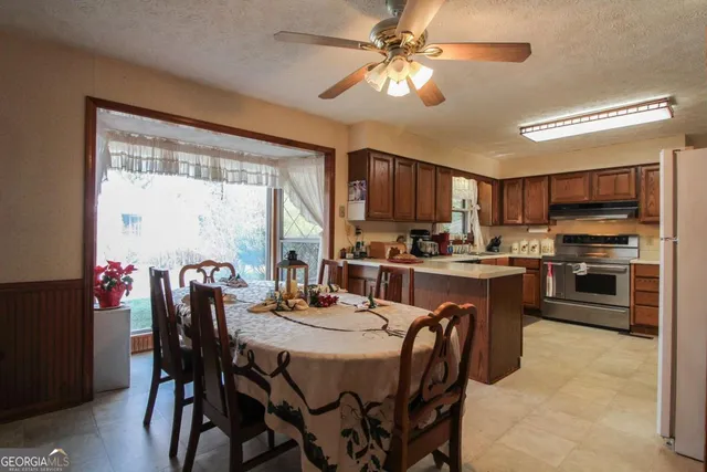 a view of a dining room with furniture