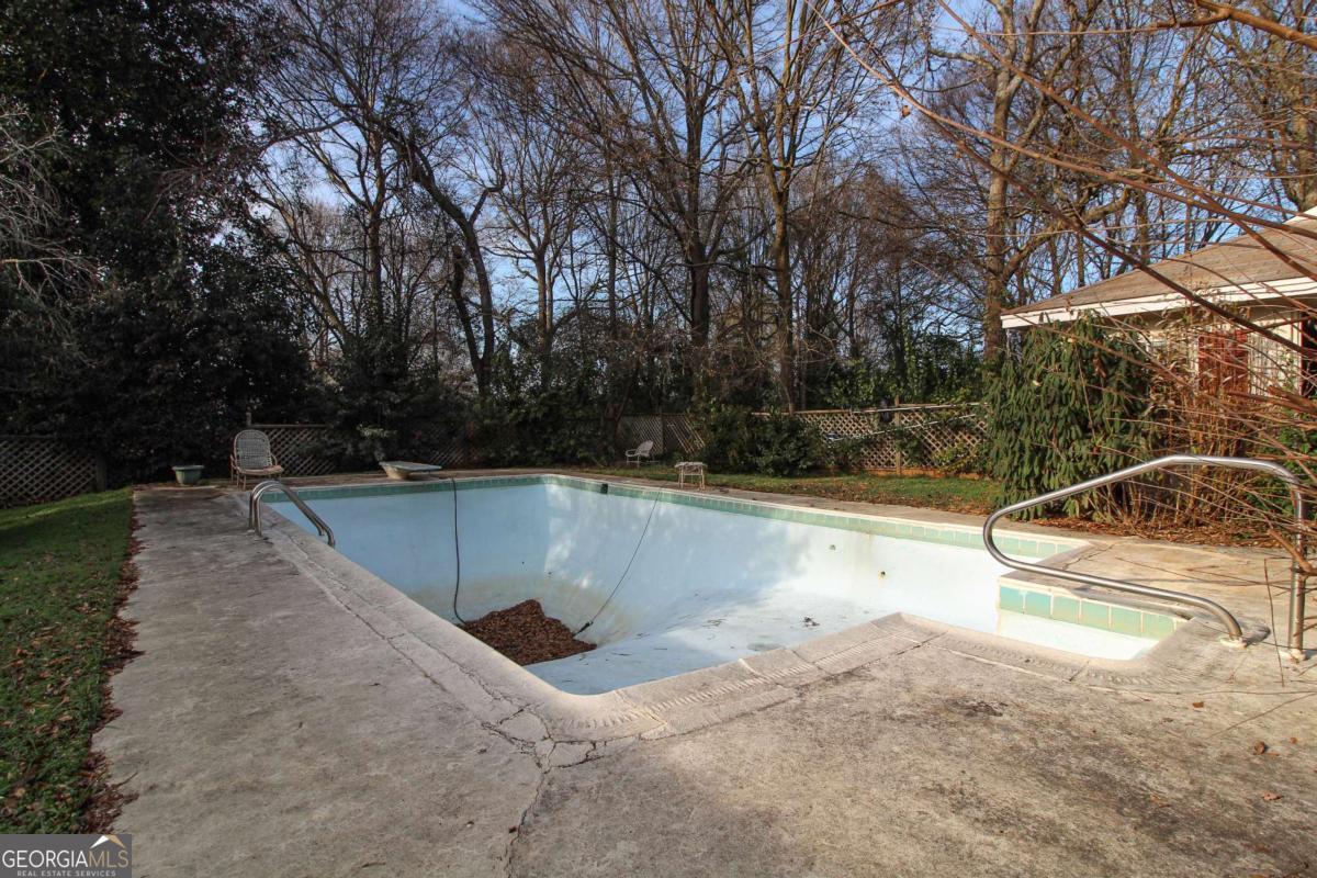 921 Highway 72 Comer, GA 30629 - Photo 36 of 55 a view of a swimming pool with an outdoor space