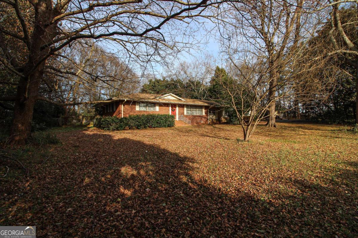 921 Highway 72 Comer, GA 30629 - Photo 4 of 55 a view of house with outdoor space