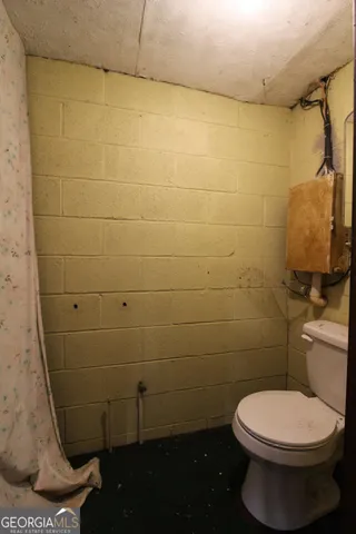 a view of a chairs and tables in patio