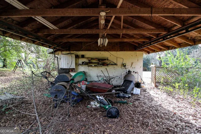 a large tree in front of a house