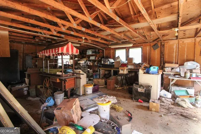 a view of a yard with a tree