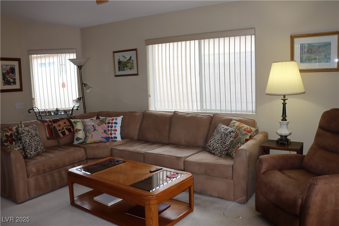 2148 Hidden Ranch Terrace Henderson, NV 89052 - Photo 16 of 31 Living room with light colored carpet