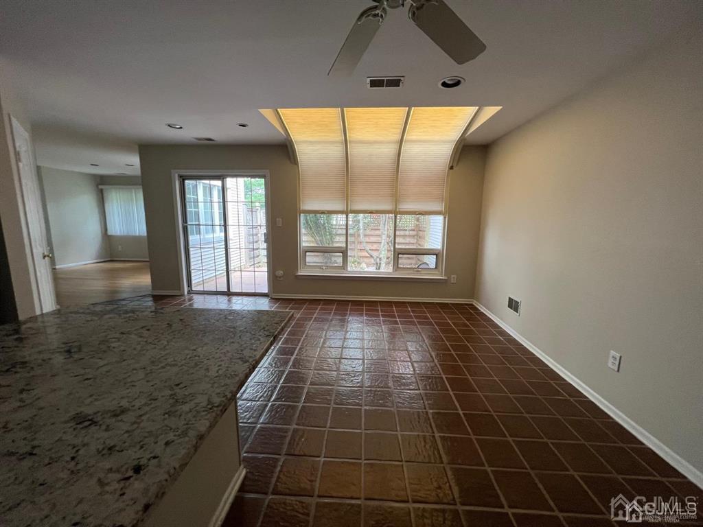 59 Winthrop Road, Unit 59A Monroe Township, NJ 08831 - Photo 8 of 13 a view of an empty room with a window