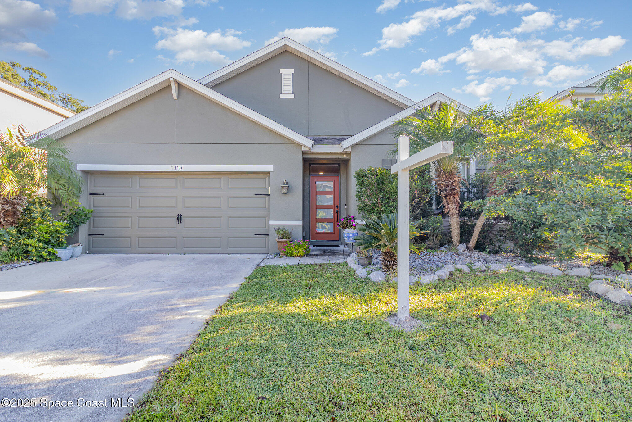 1110 Swiss Pointe Lane Rockledge, FL 32955 - Photo 1 of 26 a view of a house with backyard and porch
