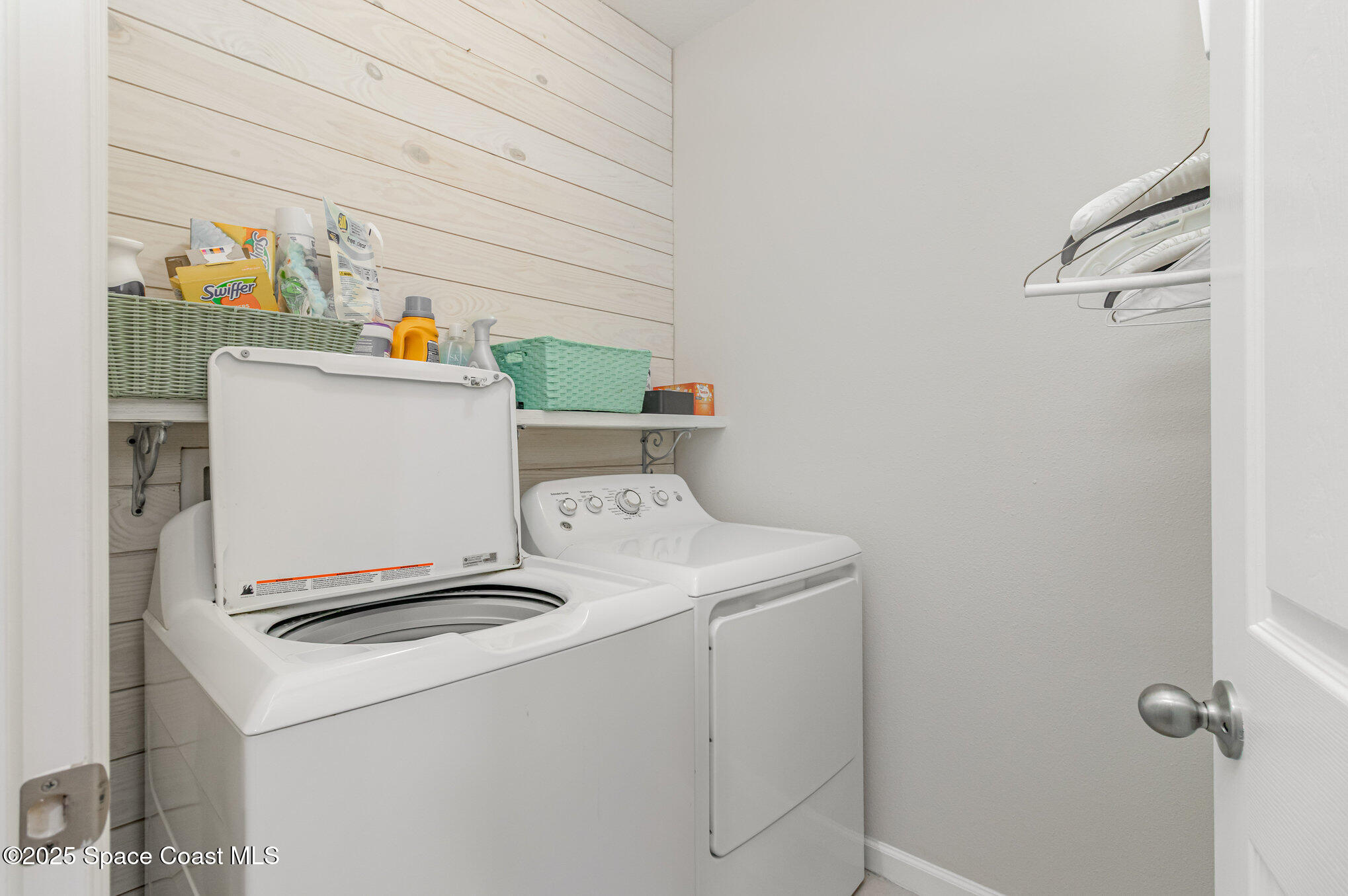 1110 Swiss Pointe Lane Rockledge, FL 32955 - Photo 11 of 26 a utility room with dryer and washer