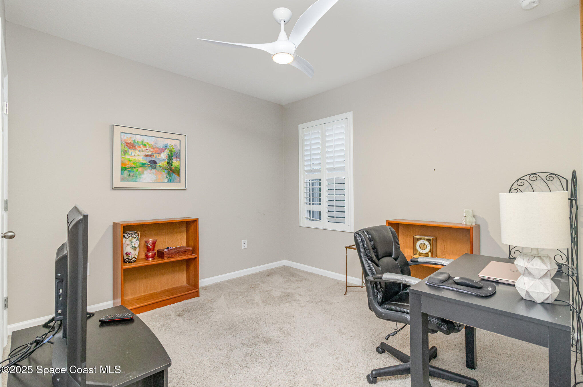 1110 Swiss Pointe Lane Rockledge, FL 32955 - Photo 20 of 26 a workspace with furniture and window